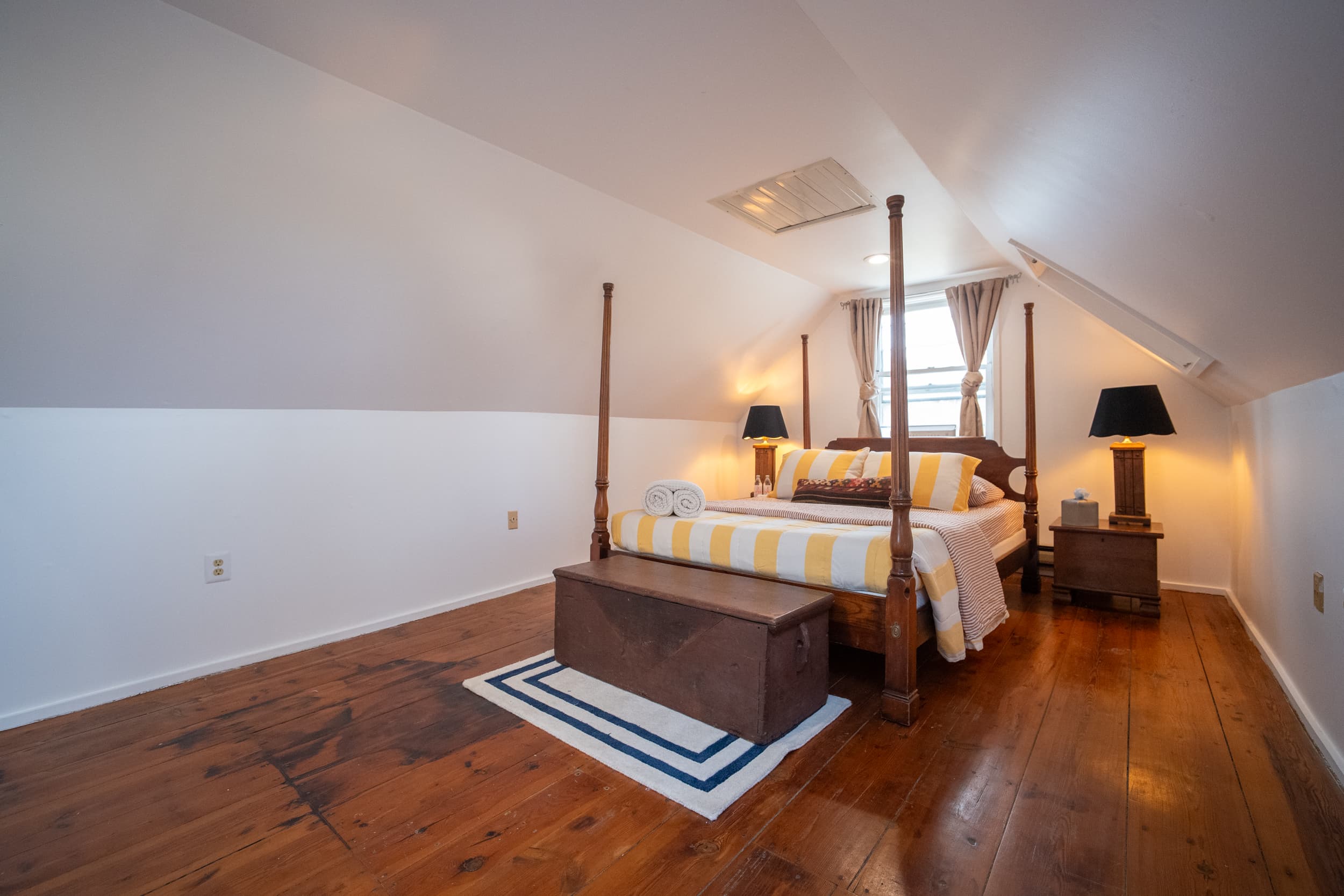 Loft bedroom with four-poster bed